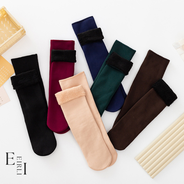 <img src="wool-socks-women.jpg" alt="A pair of women's wool socks Website Official www.eirlistore.com">