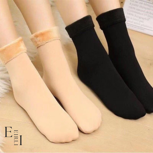 <img src="wool-socks-women.jpg" alt="A pair of women's wool socks Website Official www.eirlistore.com">