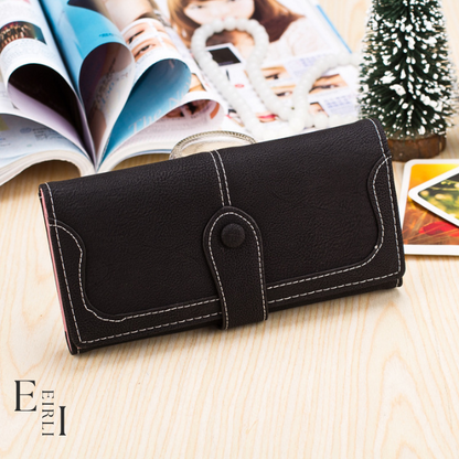 <img src="black-wallet-women.jpg  alt="  Beautiful ladies long wallet, black, official website www.eirlistore.com">